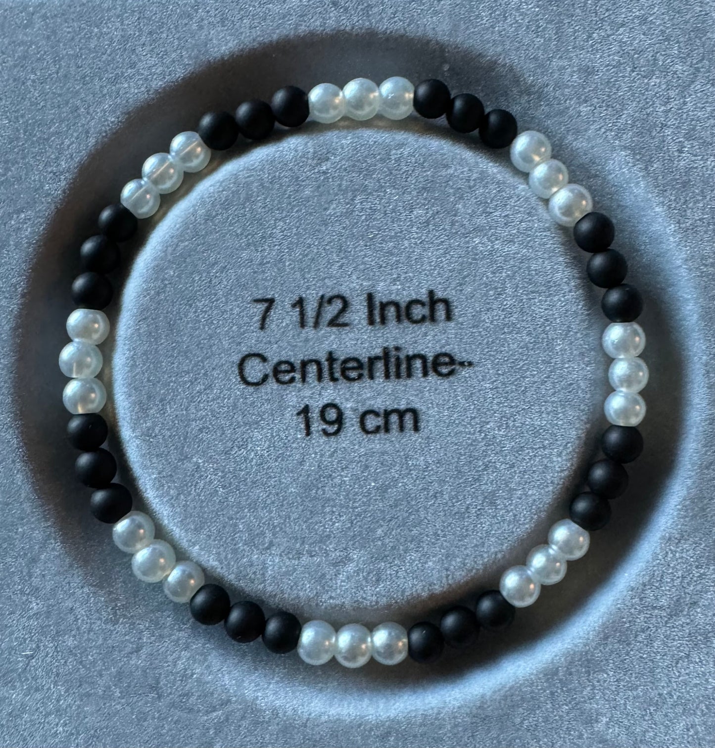 7.5 Inch Matte Black Onyx and White Glass-Pearl Bead Stretch Bracelet